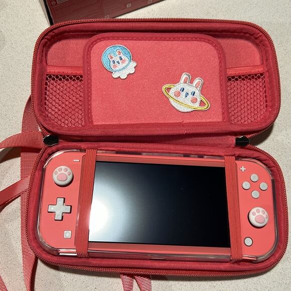 Nintendo Switch Lite Coral Handheld Console - Picture 7 of 12